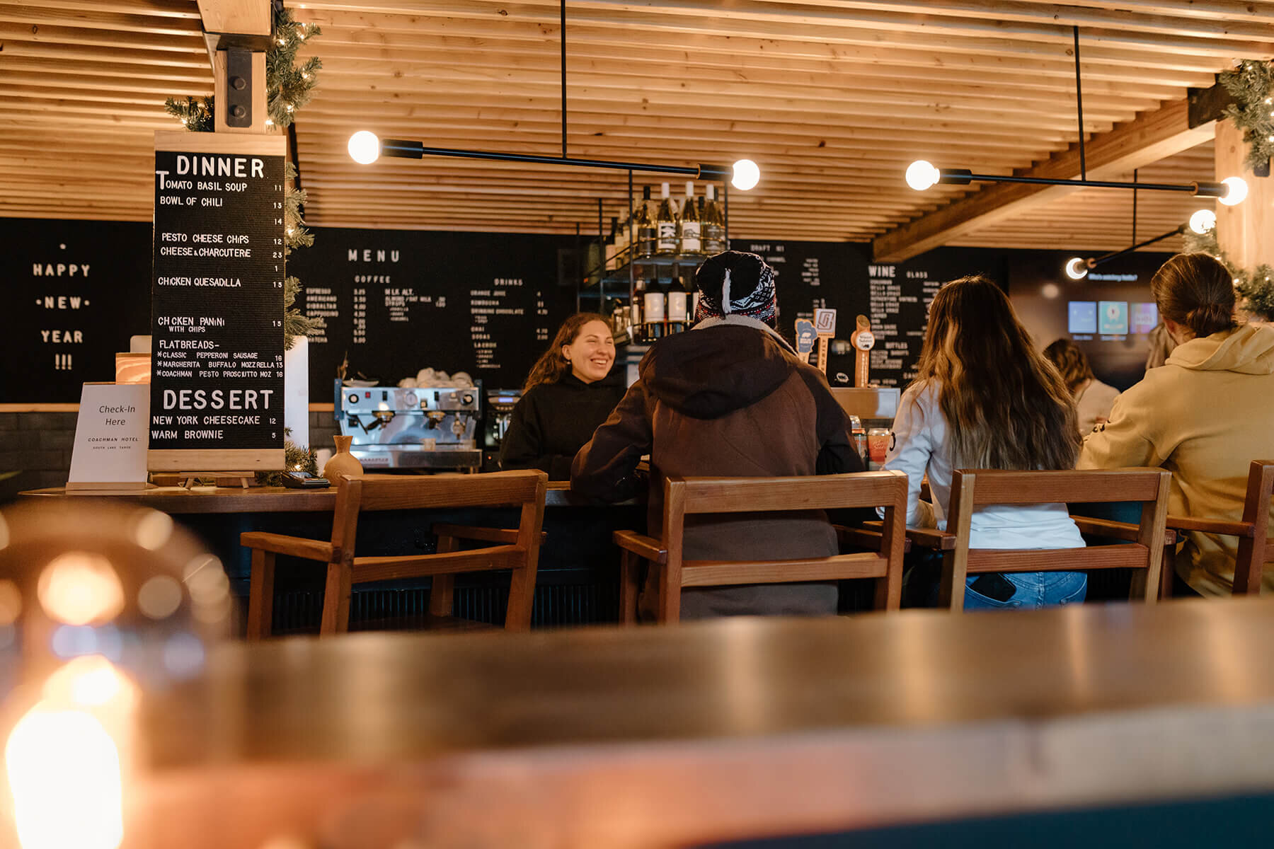 a restaurant with people sitting at tables